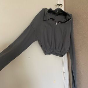 Cropped pretty little thing, blue/gray sweater, no hood